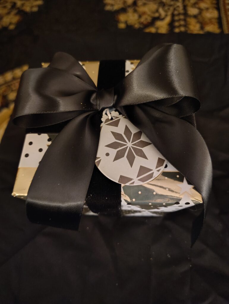 black ribbon with black snowflake orn.2